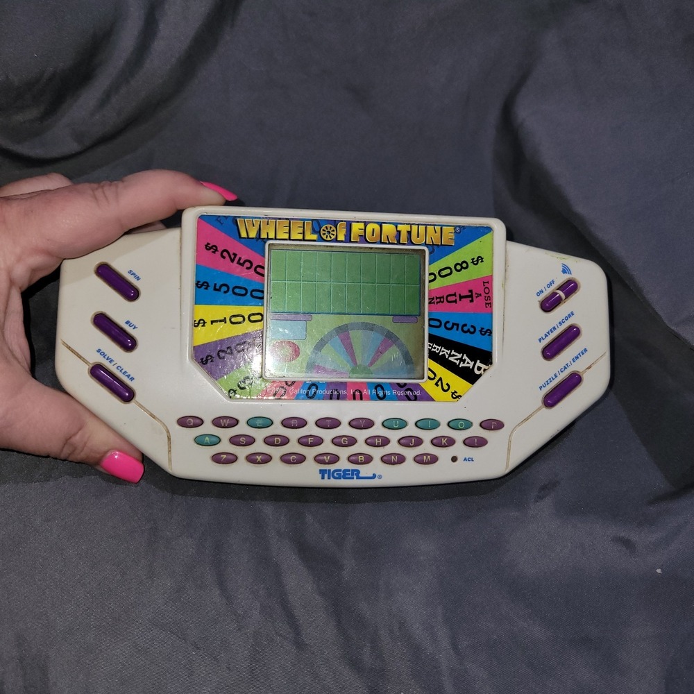 VTG  1995 Tiger Wheel of Fortune Electronic Handheld Travel Game TESTED WORKS